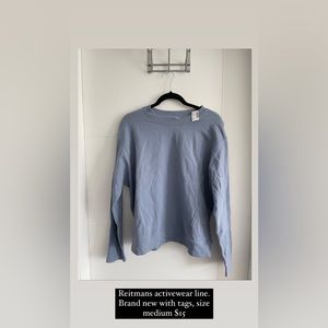 Reitman’s activewear line indigo pullover. BNWT. Size medium.